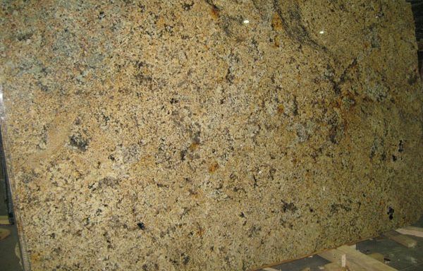 A large piece of granite is sitting on a table.