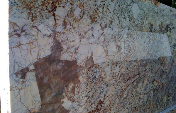 A large piece of granite is sitting on a table.