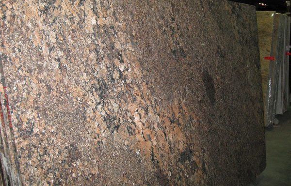 A large piece of granite is sitting on top of a table.