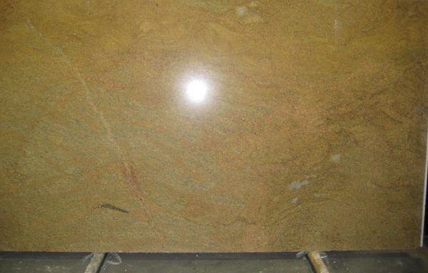 A close up of a piece of marble on a table.