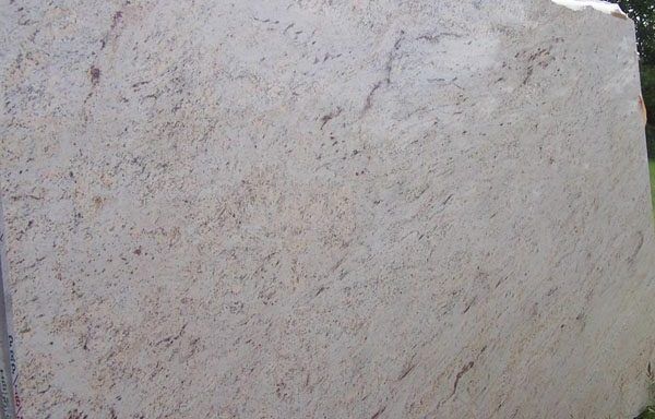 A close up of a white granite slab