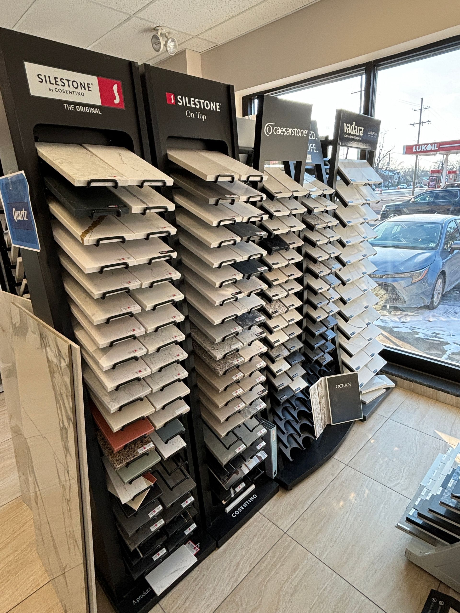 There are many different types of tiles on display in this store.