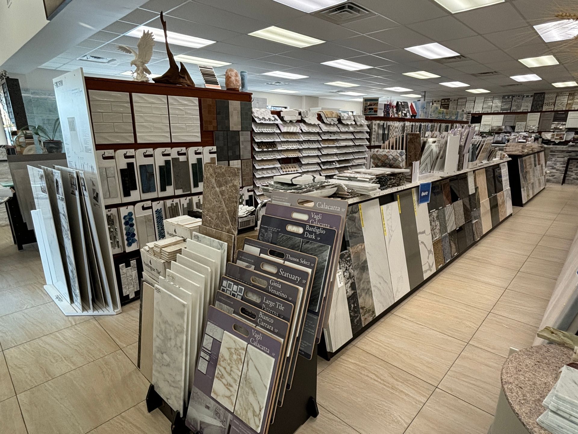 A tile store filled with lots of tiles on display.