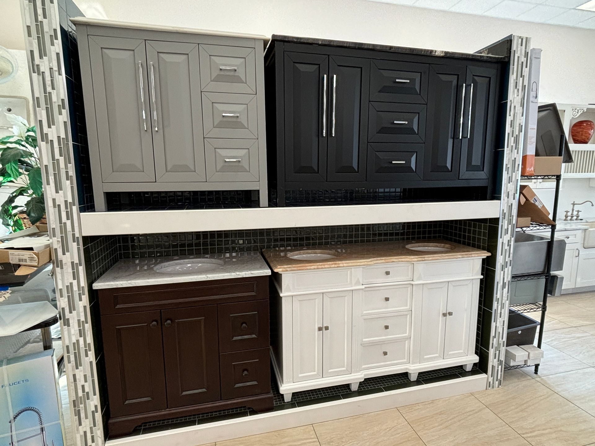 A display of cabinets and sinks in a store.