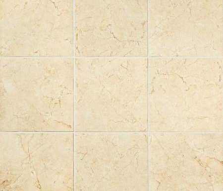 A close up of a tile floor with a marble texture.