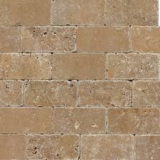 A close up of a brick wall with a white background.