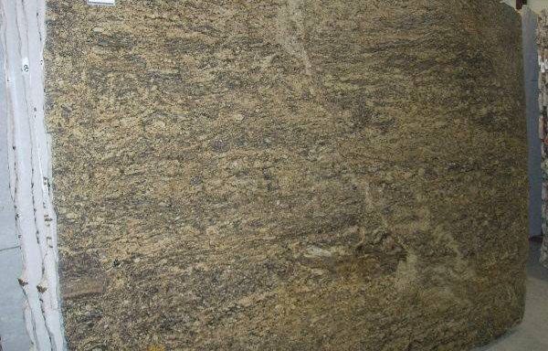 A large piece of wood is sitting on top of a table.