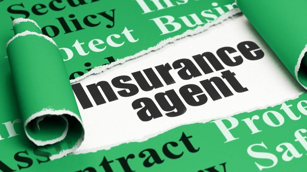 Torn green paper revealing 