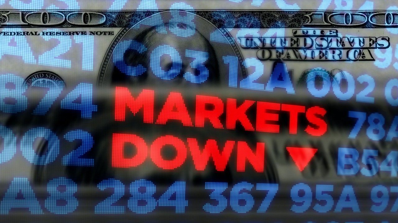 Image of a U.S. dollar bill overlaid with digital stock market data and the words 