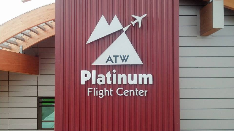 A sign for the atw platinum flight center