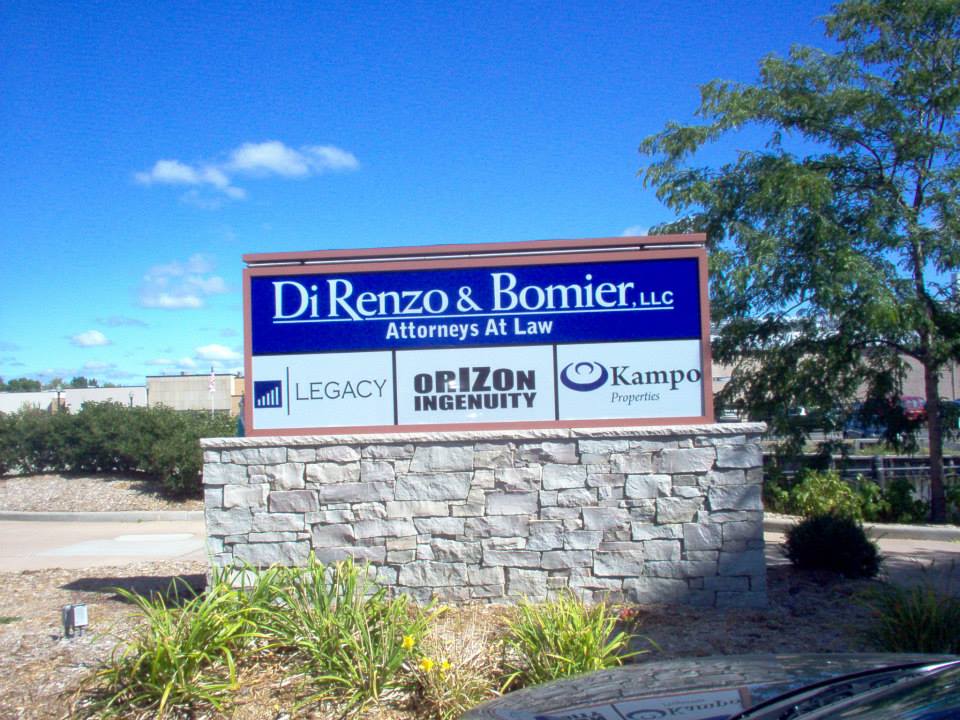 A sign that says di renzo & bomier on it