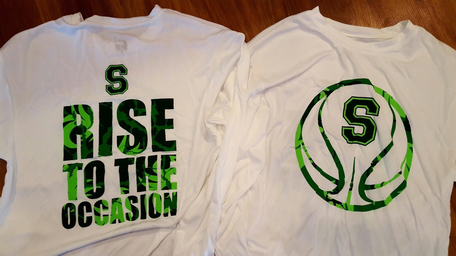 A t-shirt that says ' rise to the occasion ' on it
