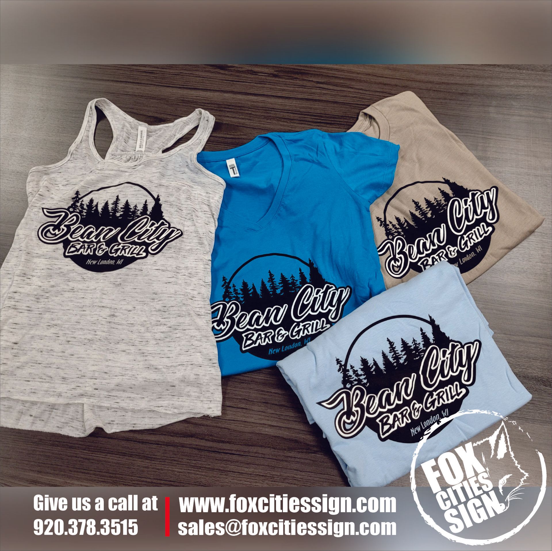 Four bear city shirts are stacked on top of each other