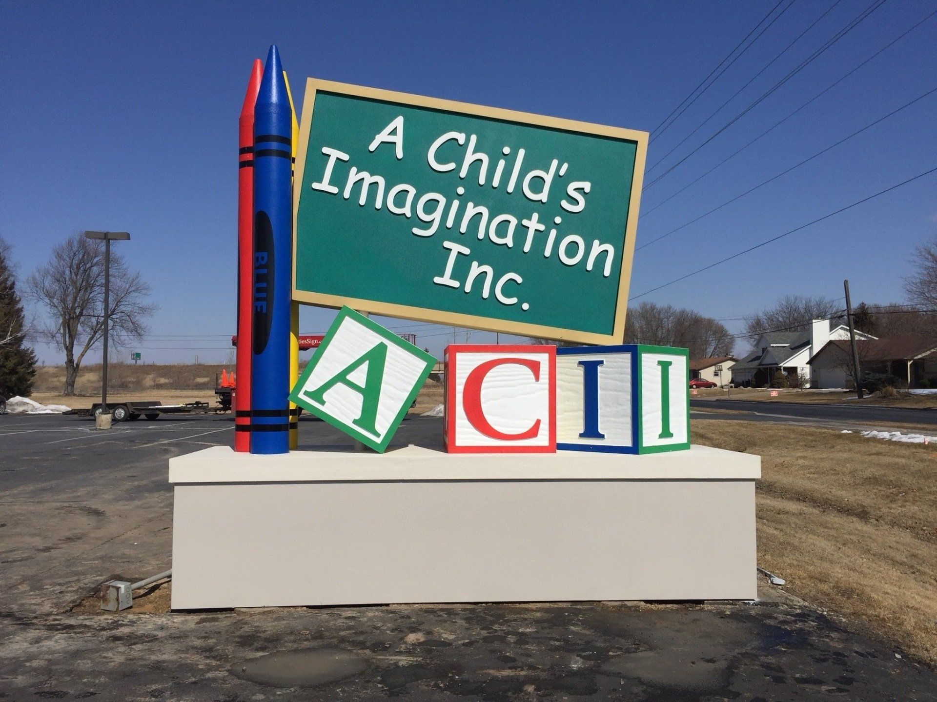 A sign that says a child 's imagination inc. on it