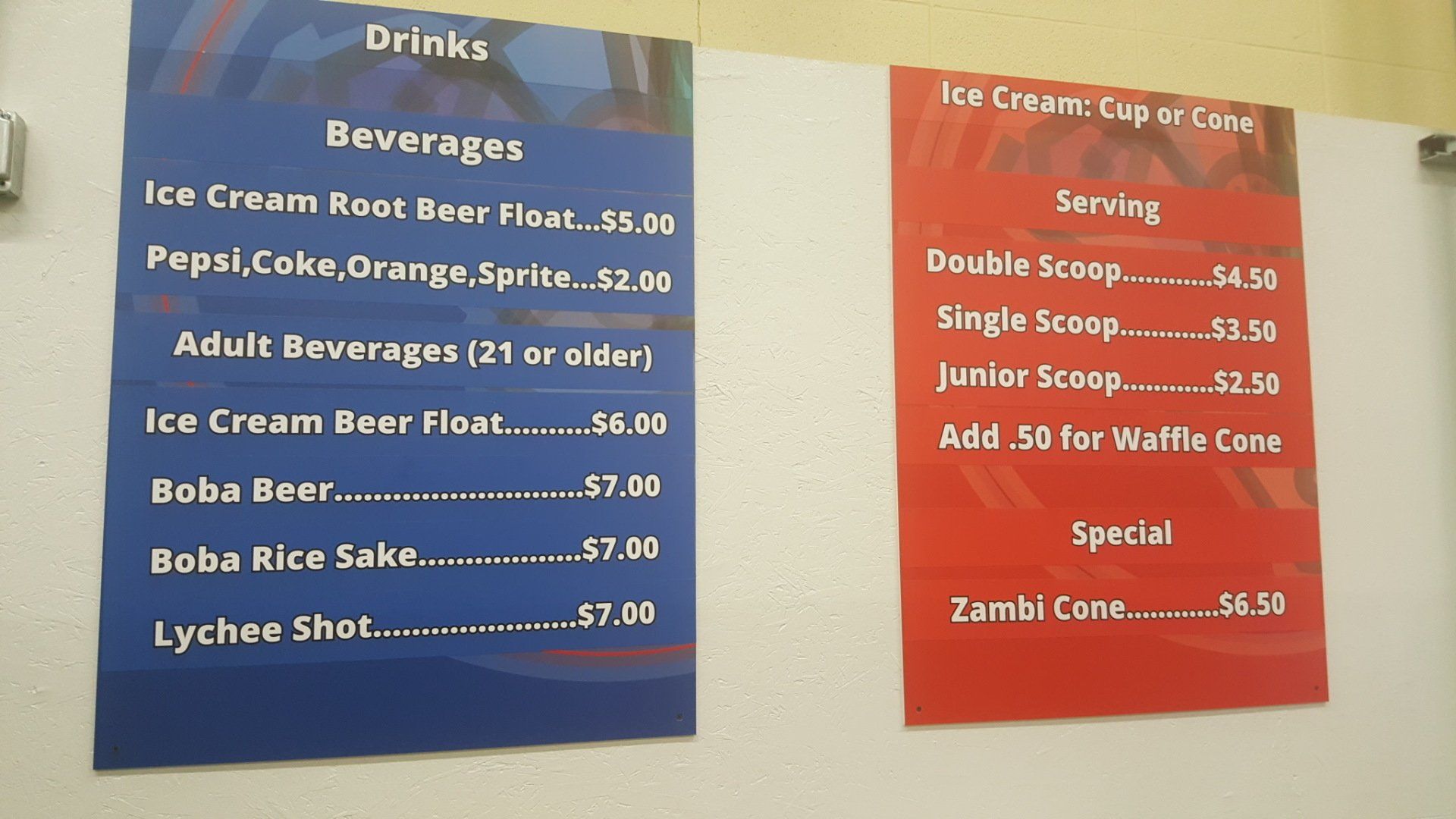 A menu for drinks and beverages on a wall