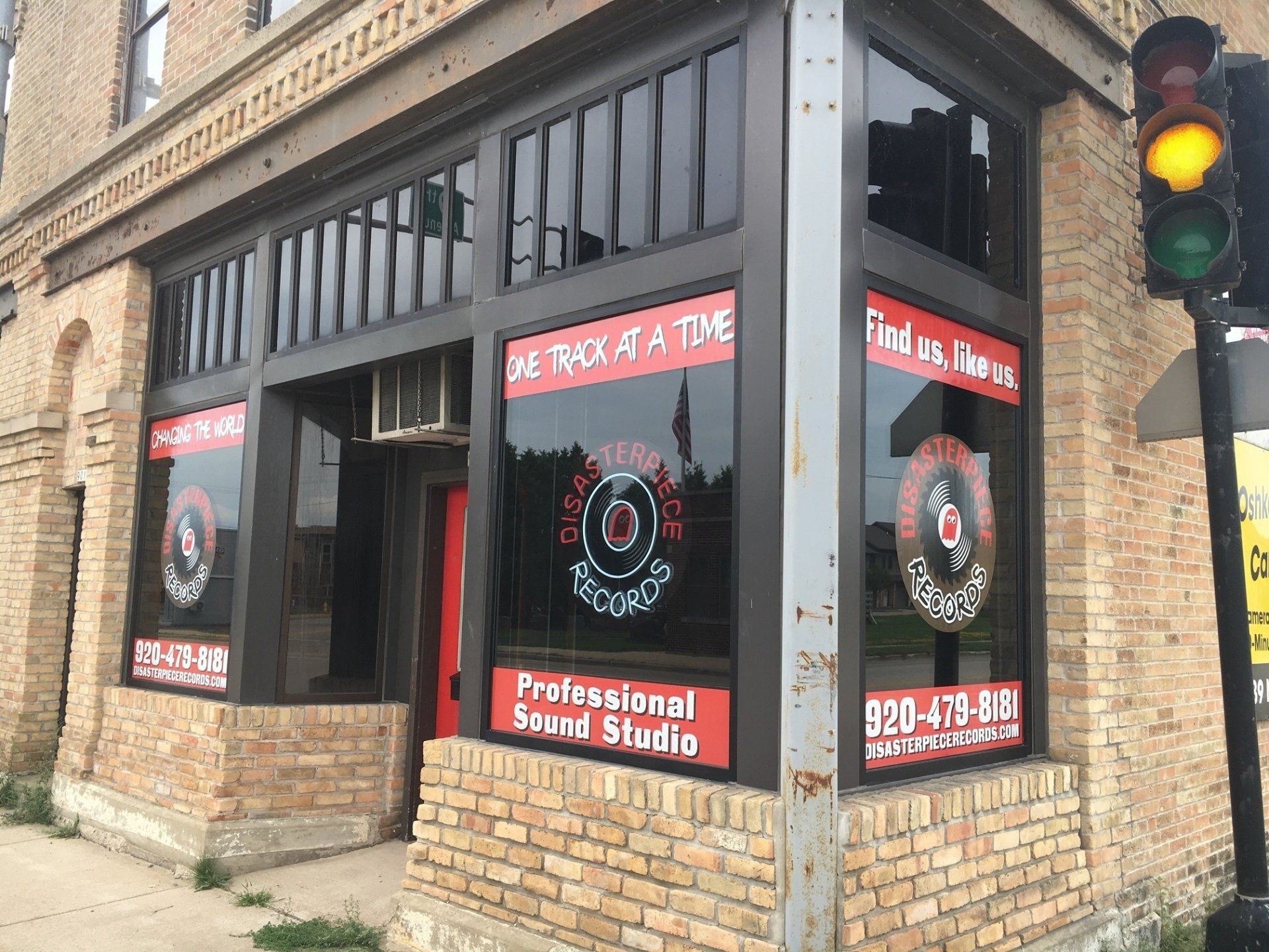 A brick building with a sign that says `` we trust a time ''