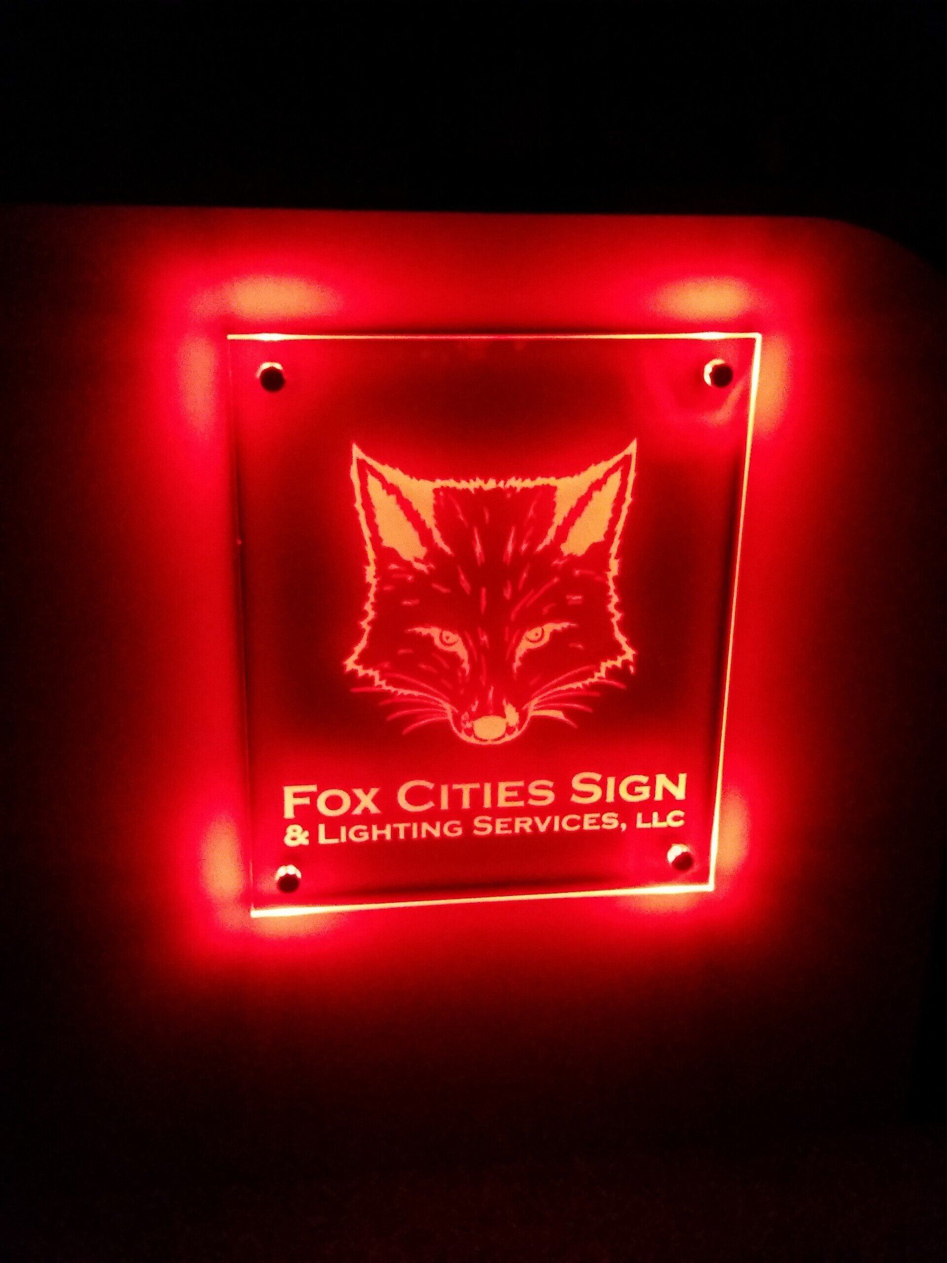 A red sign that says fox cities sign on it