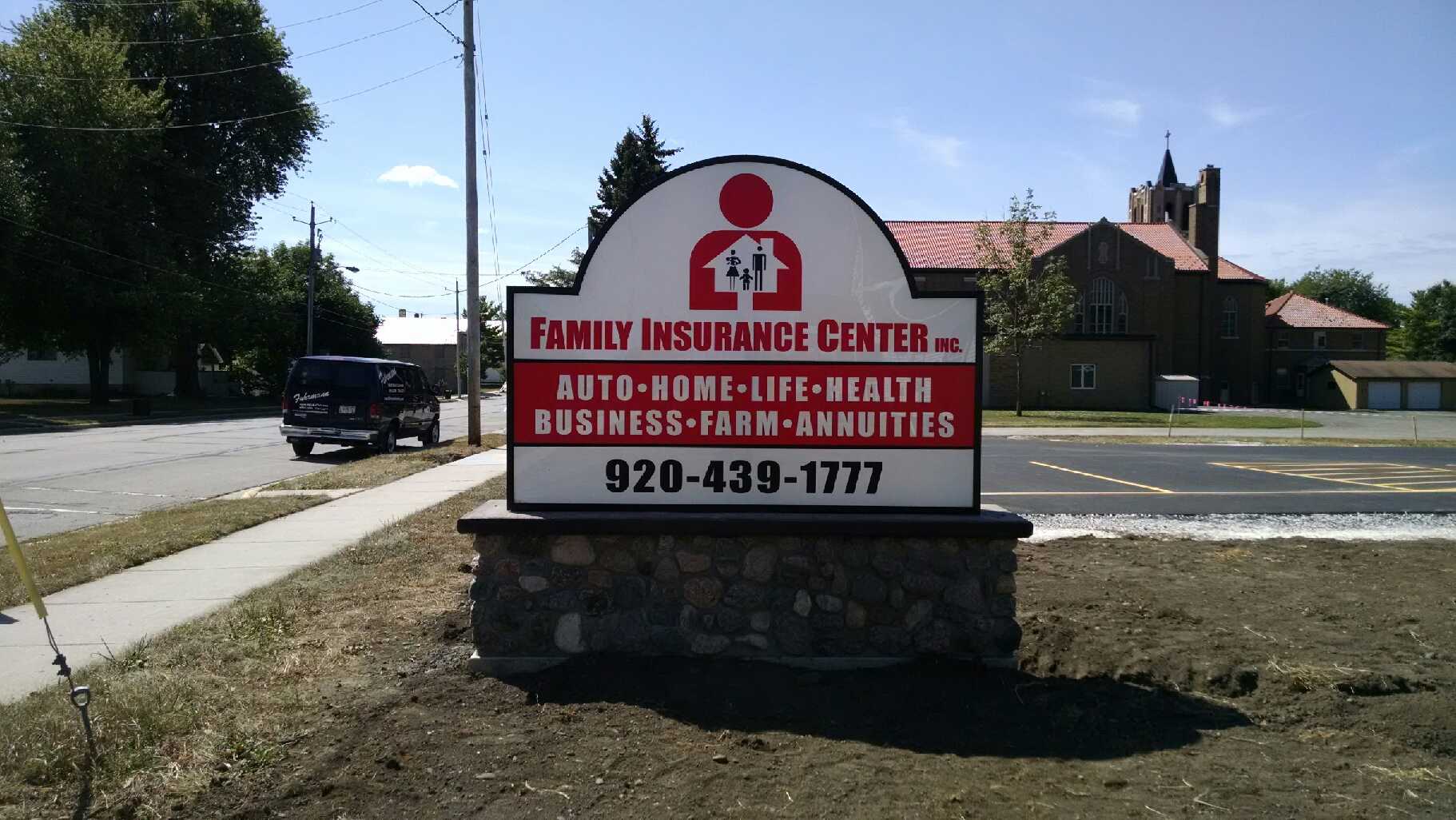 A sign that says family insurance center on it