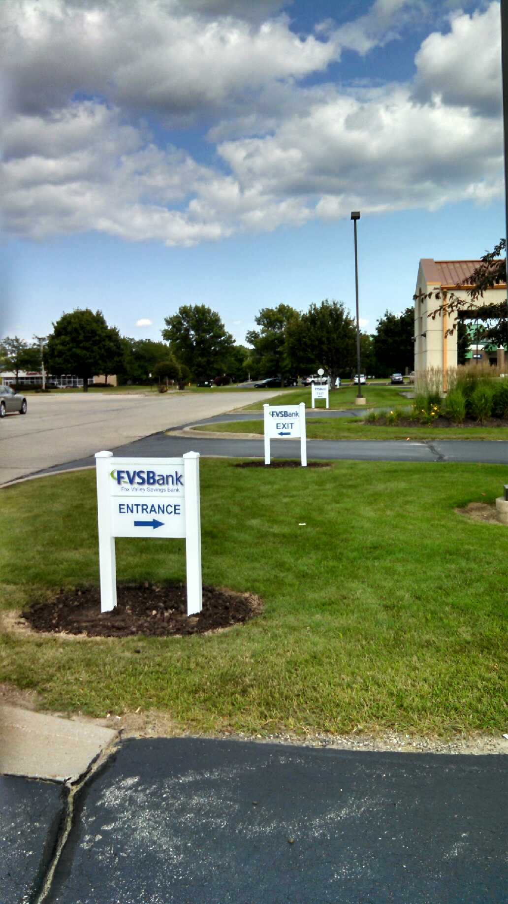 A parking lot with a sign that says ev steak