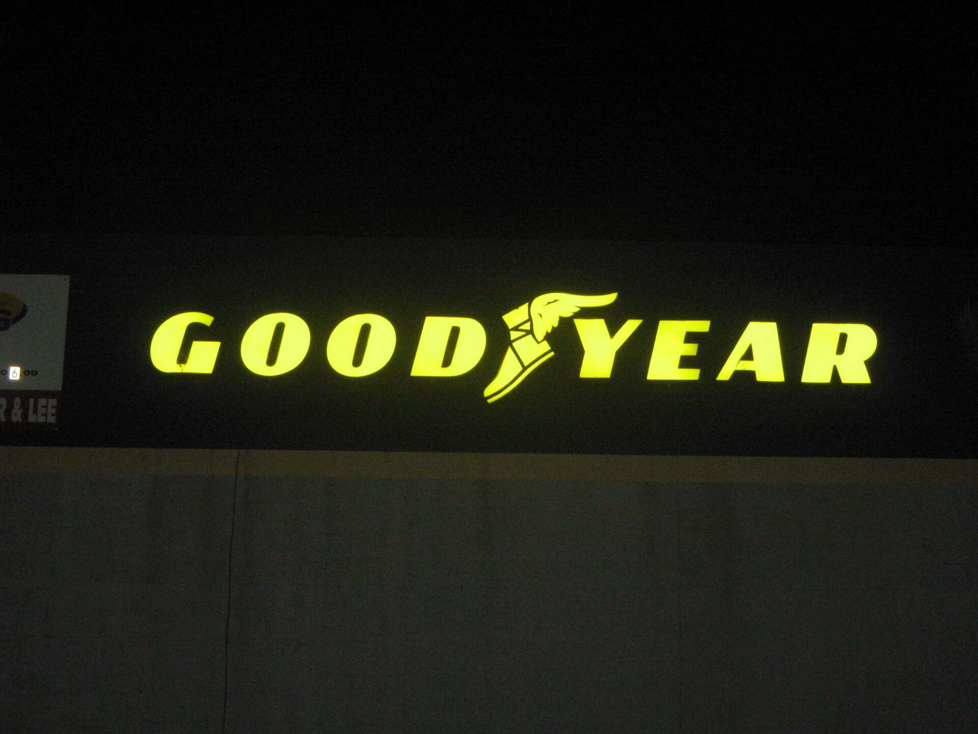 A good year sign is lit up at night
