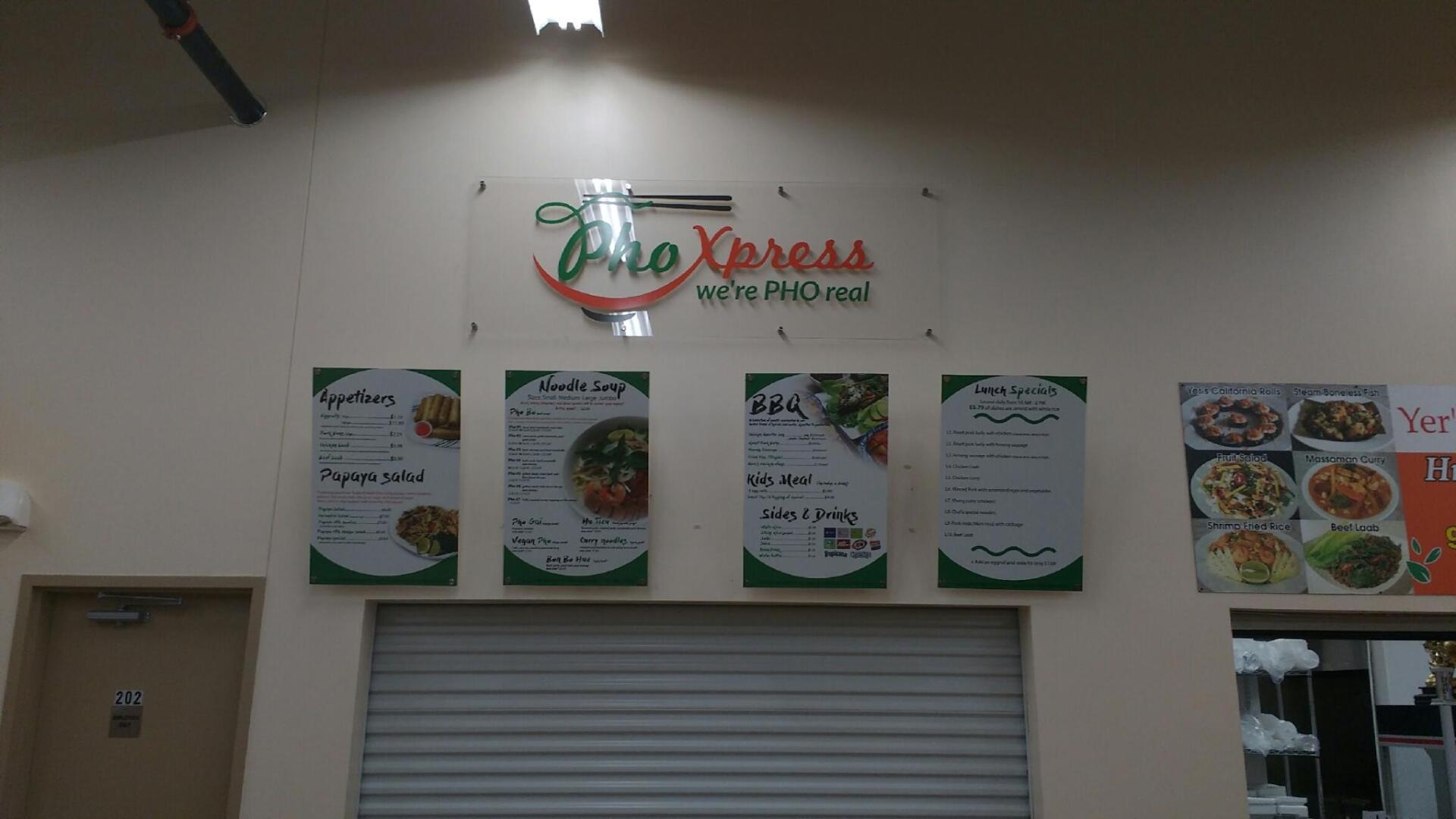 A restaurant with a sign that says pho express on it