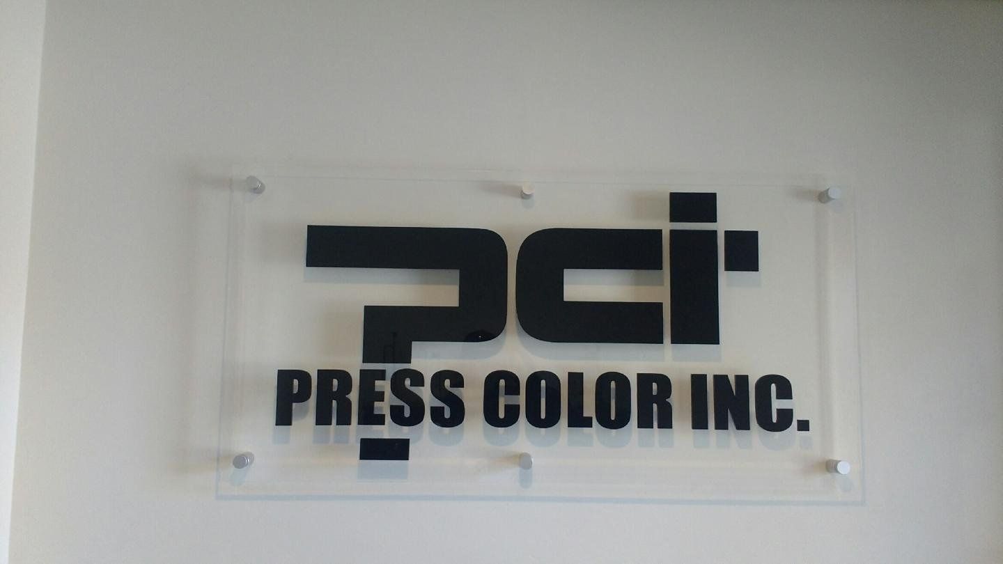A sign that says pci press color inc. on it