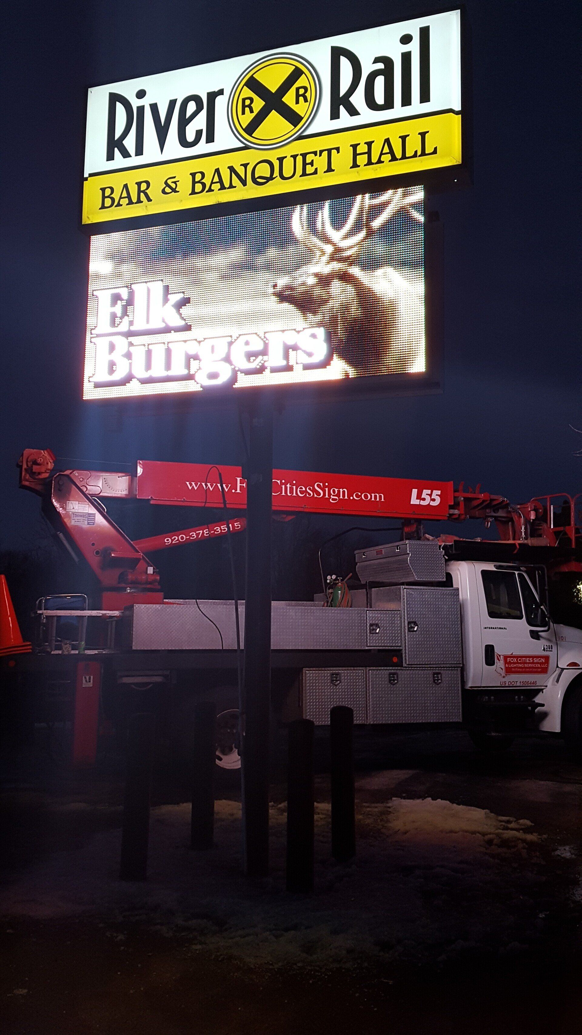 A large sign for river rail bar and banquet hall