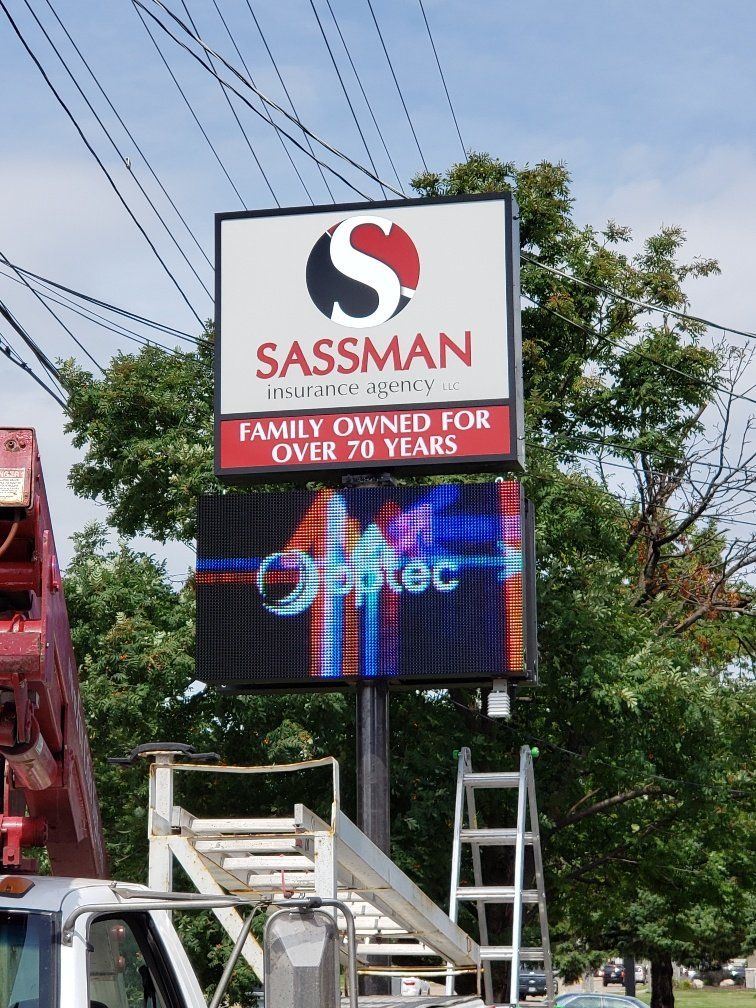 A sign that says sassman family owned for over 70 years