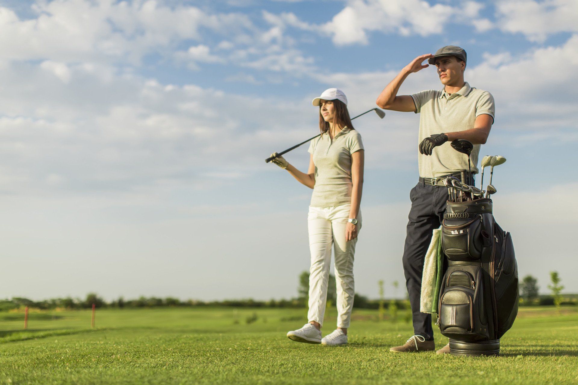 A couple golfing