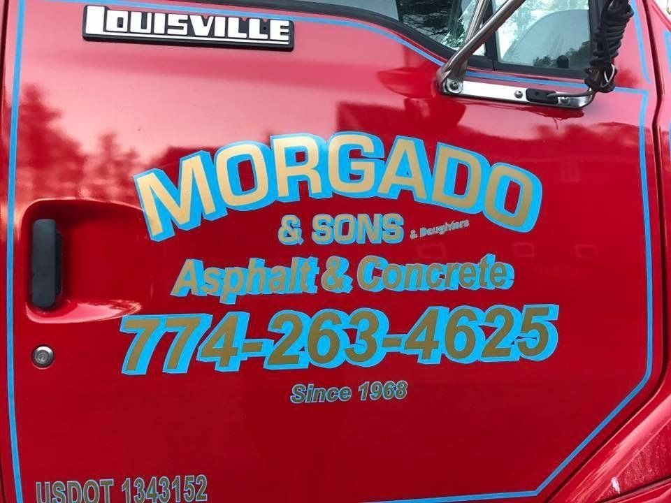A red truck with the word morgado on it