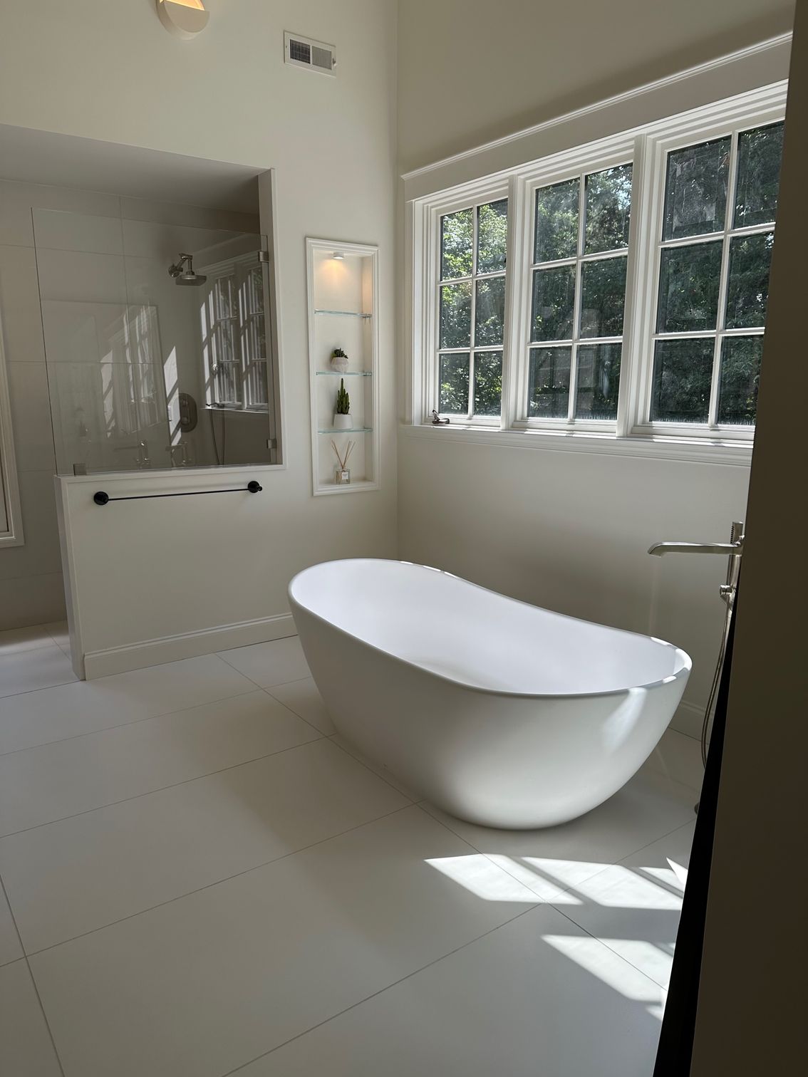 Glass enclosure on bathroom