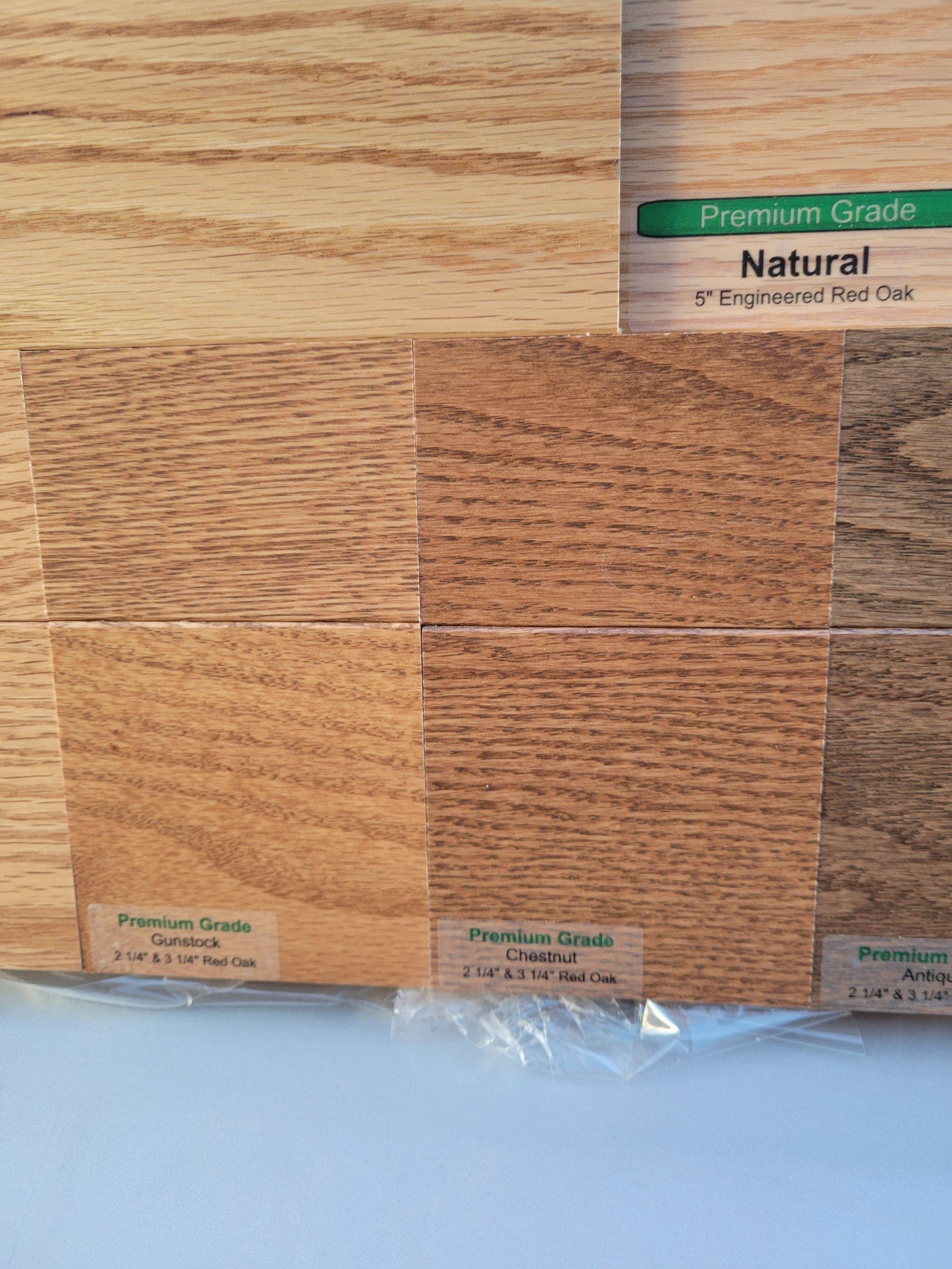 Wood flooring samples in various shades of brown. 