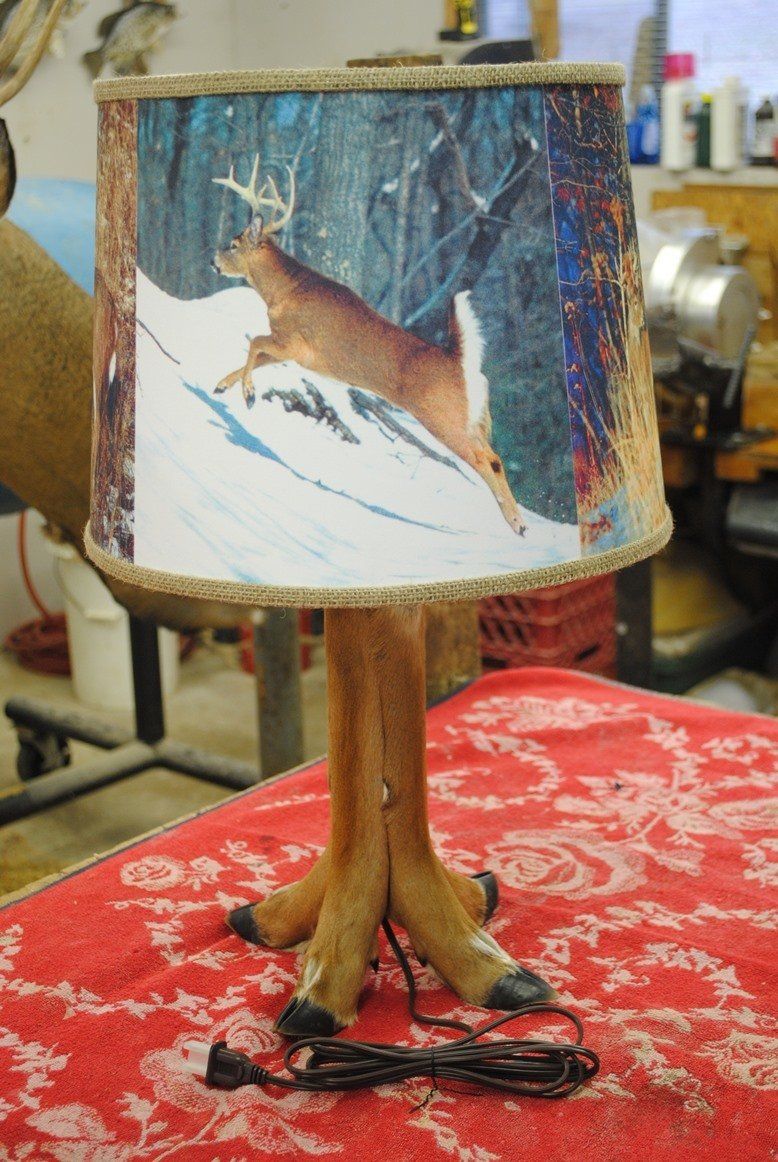 Lamp shade with animal feet