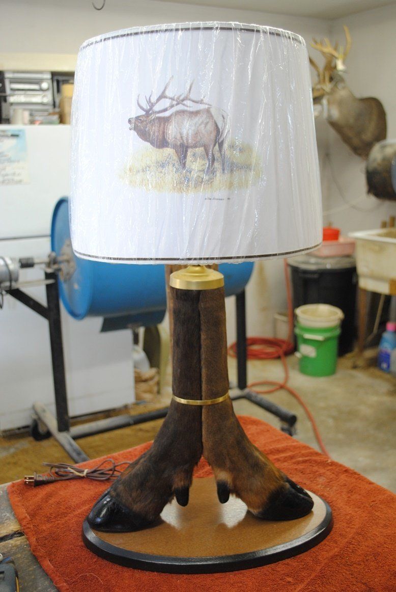 Lamp shade with animal feet