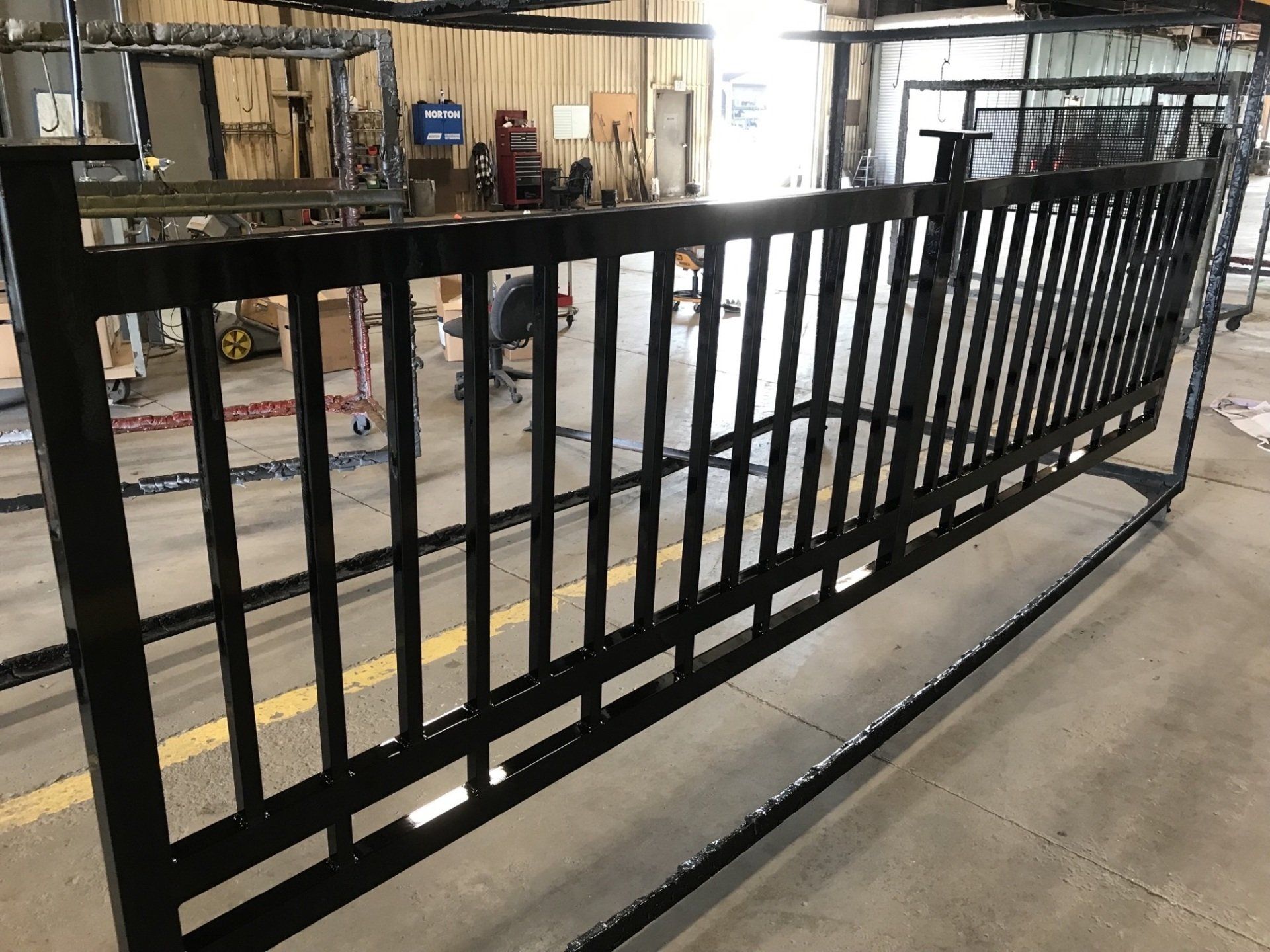 Custom black metal fence