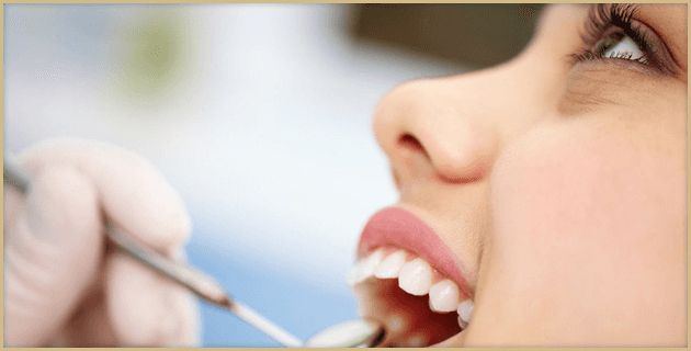 Woman having teeth checkup