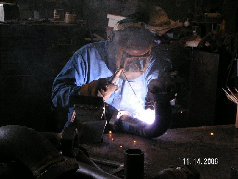 A man is welding in a dark room on november 14 2006