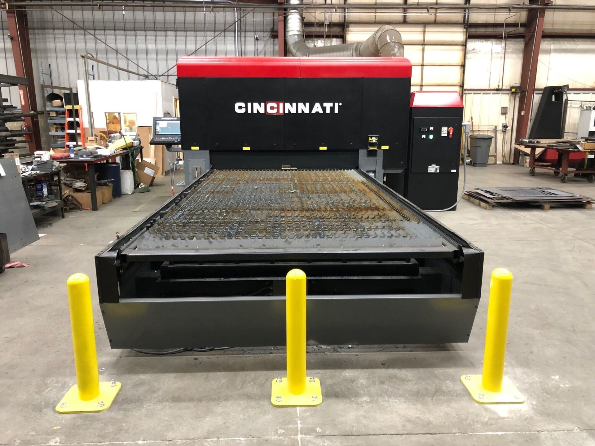 A machine that says cincinnati is in a factory