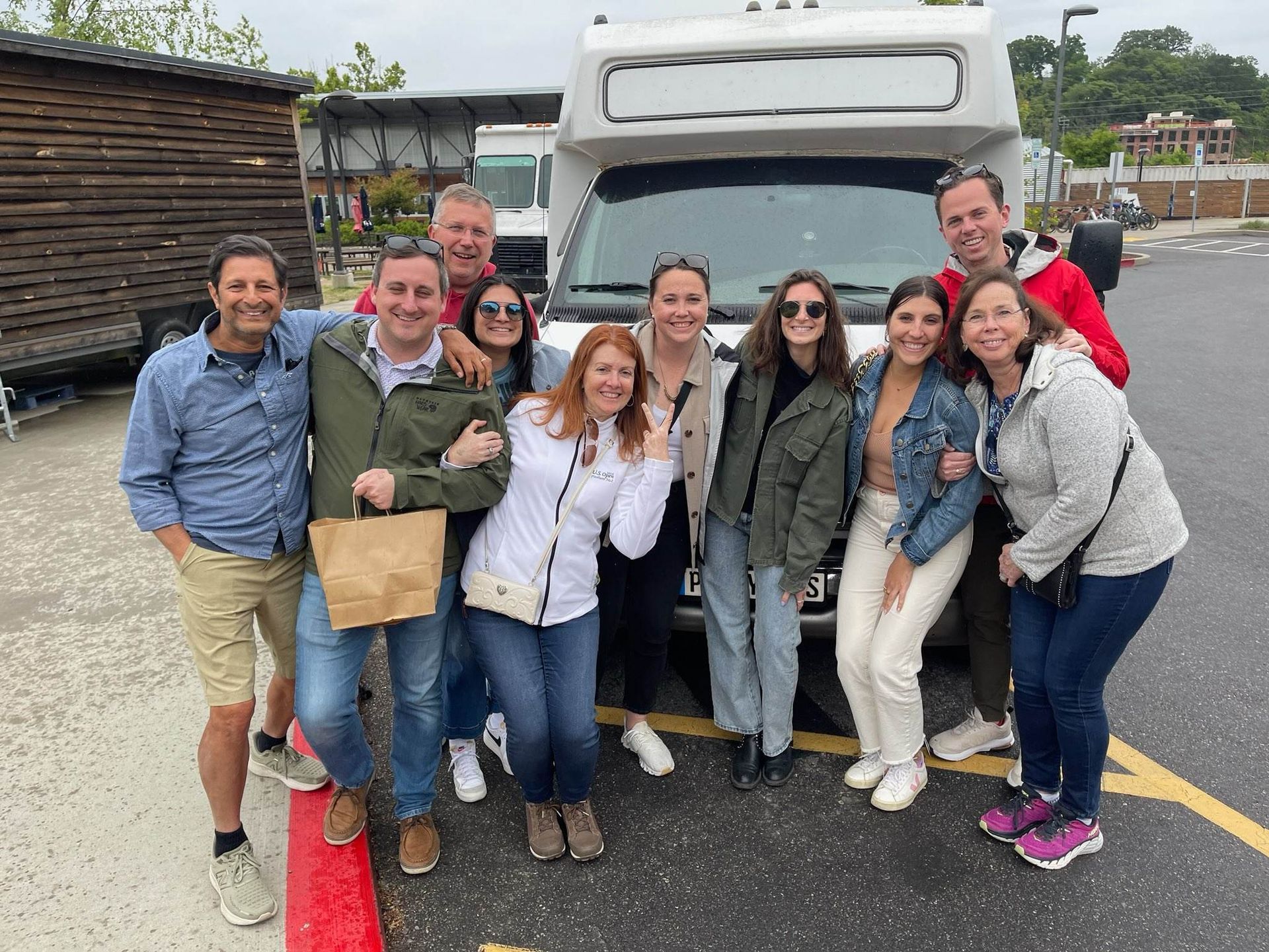 People outside a party bus