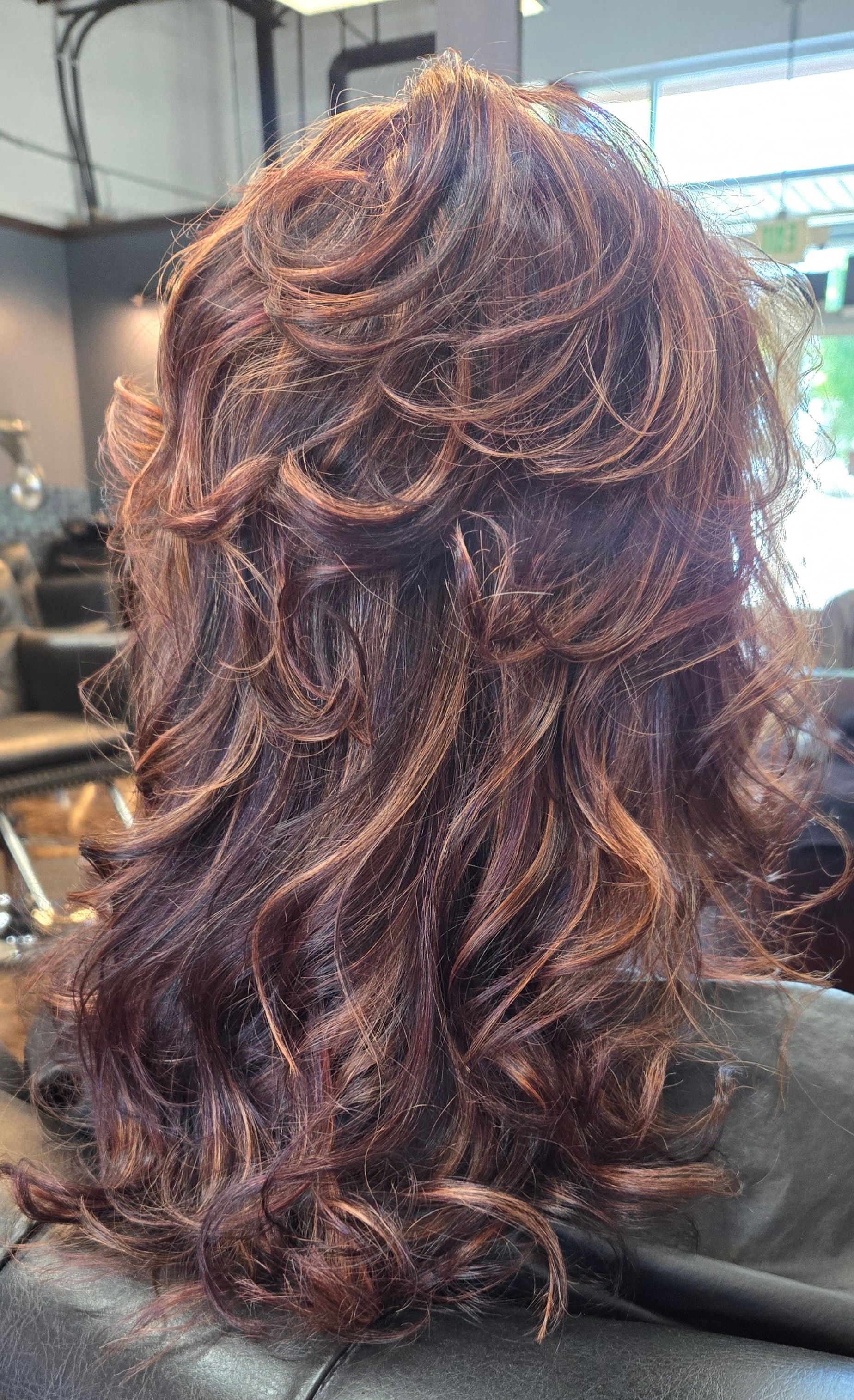 A close up of a woman 's hair in a salon.