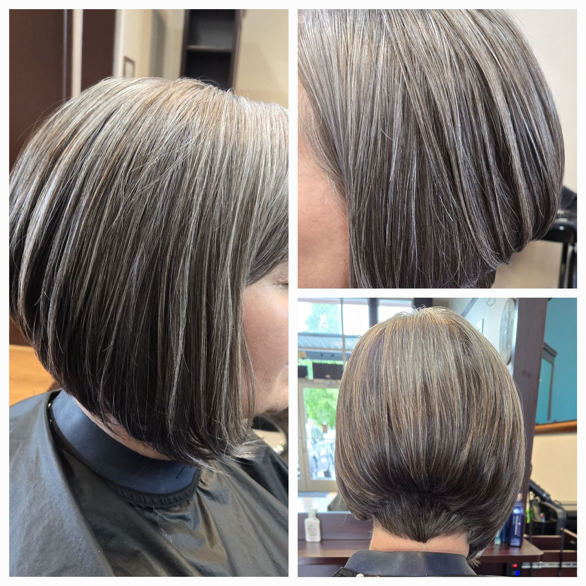 A woman is getting her hair cut in a salon