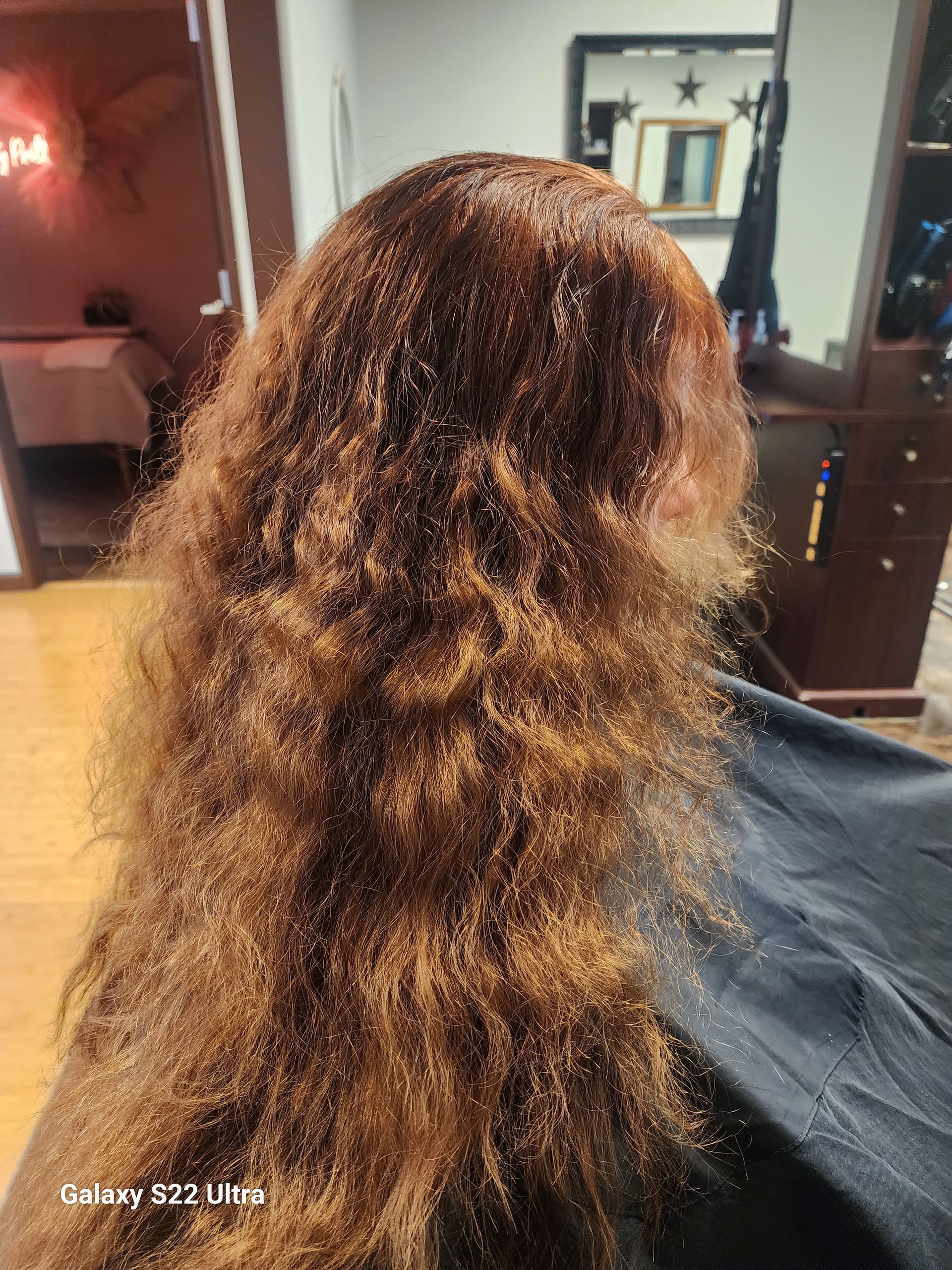 A close up of a woman 's hair in a salon.