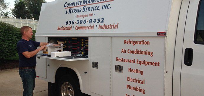 man with Complete Maintenance & Repair Service Inc -van