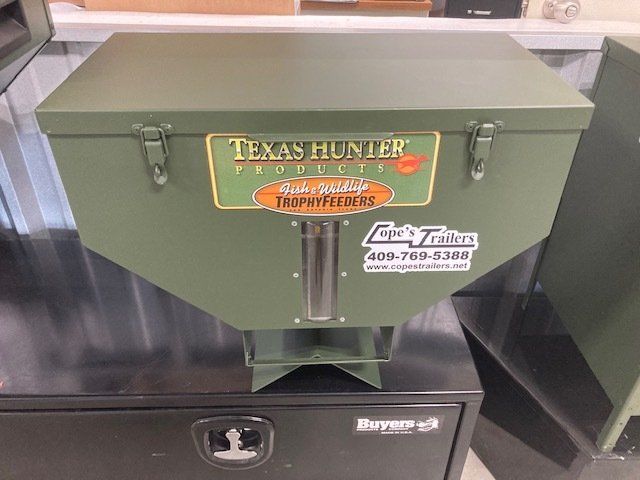 A green box that says texas hunter products on it