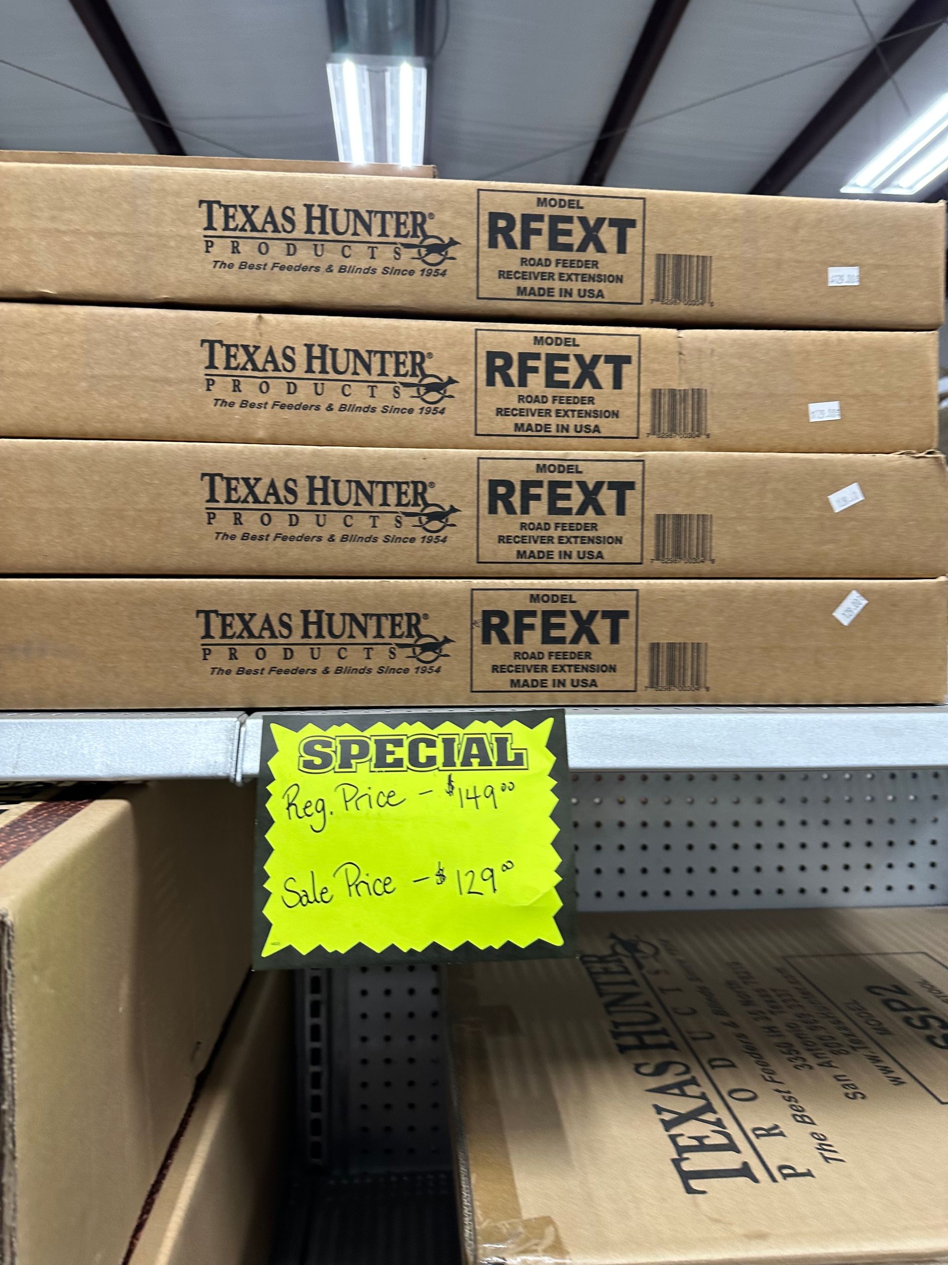 Boxes of texas hunter products are stacked on top of each other