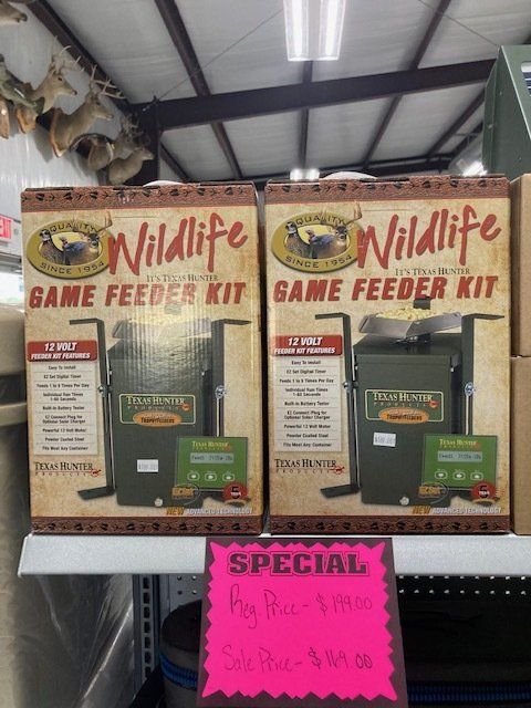 Two boxes of wildlife game feeder kit on a shelf
