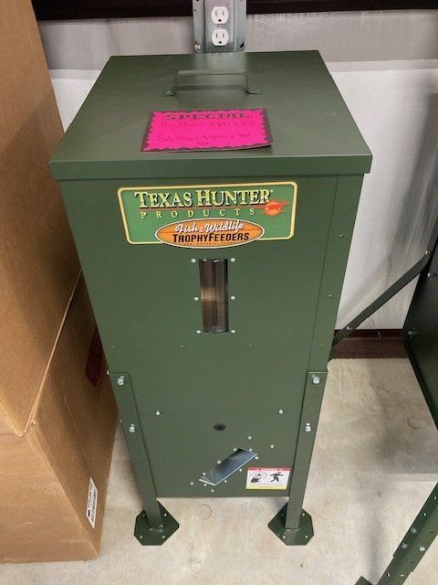 A green box that says texas hunter products on it