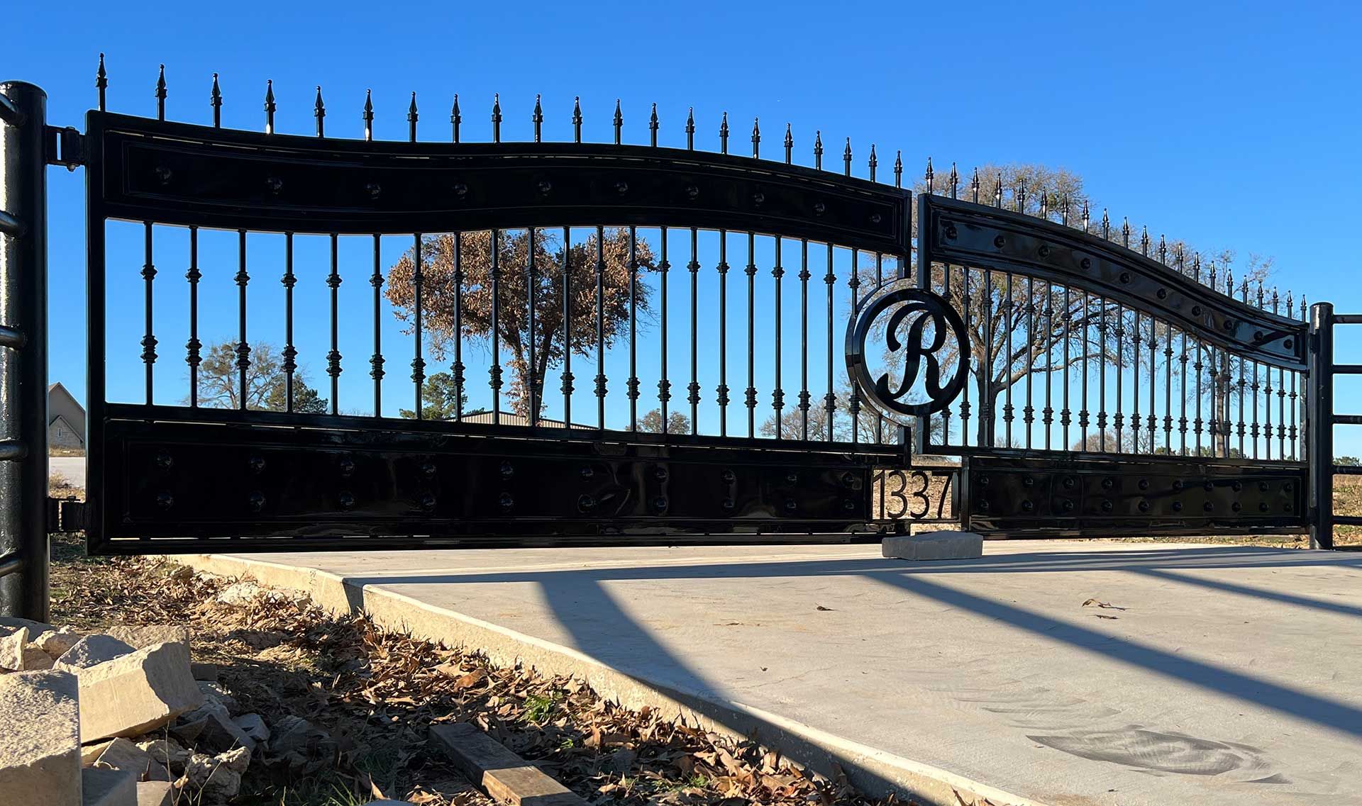 Black iron gate with an