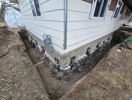 Push pier solution for settling foundation