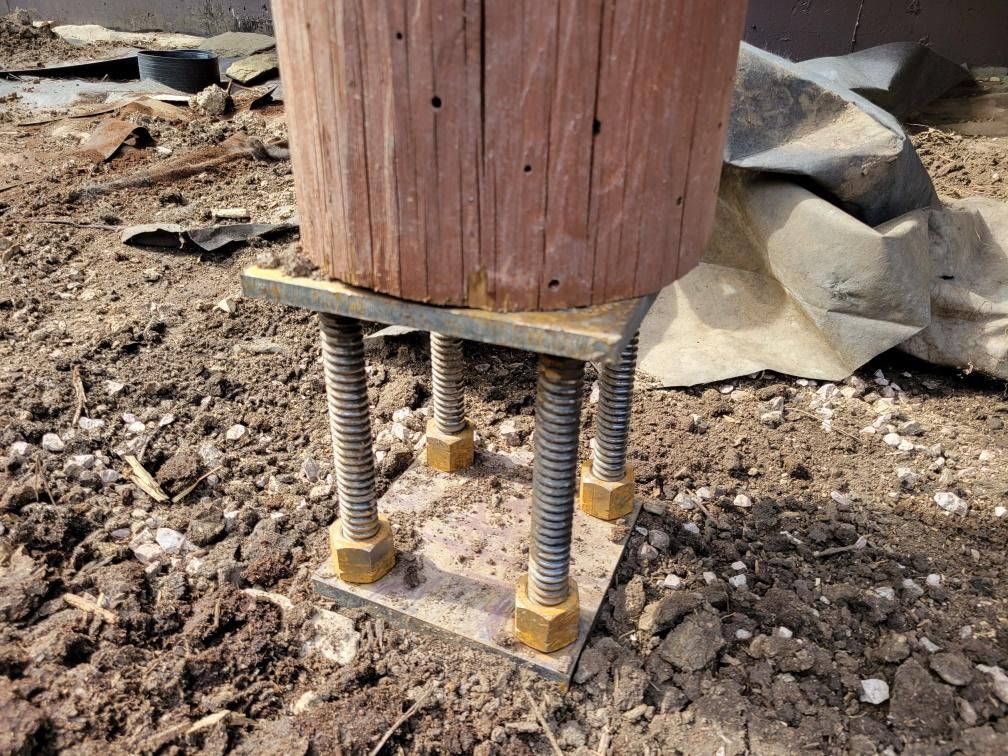 Installed concentric push pier directly underneath the main posts